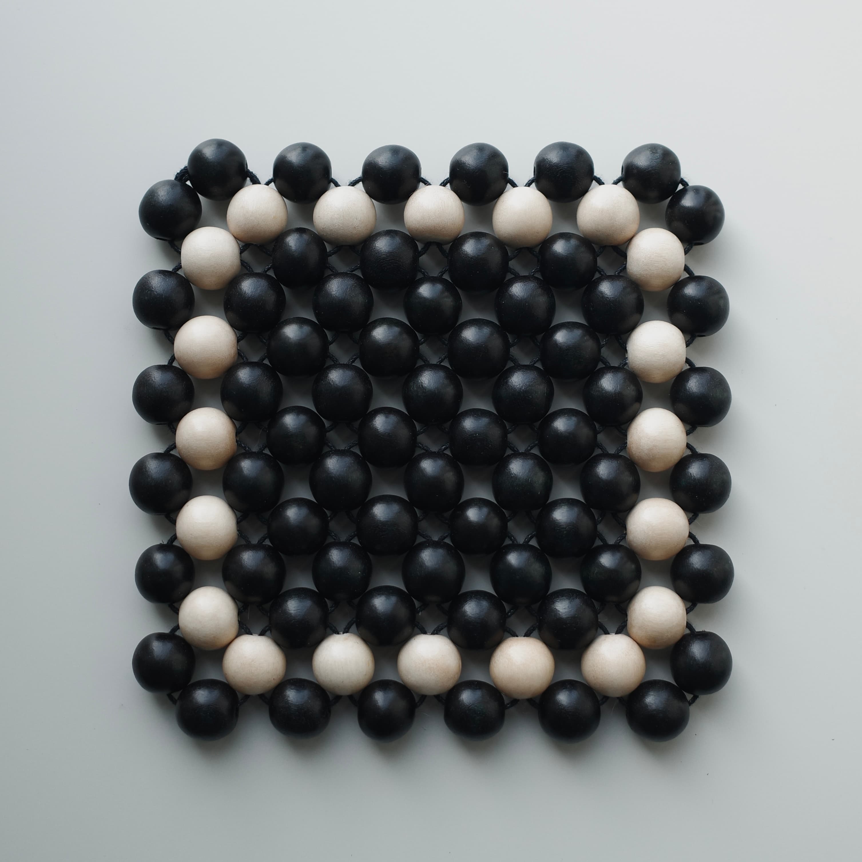 Trivet, Black